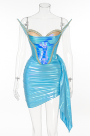 Mannequin wearing a blue dress with a sheer overlay on a white background