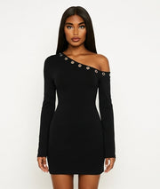 Black one-shoulder dress with embellishments on a white background