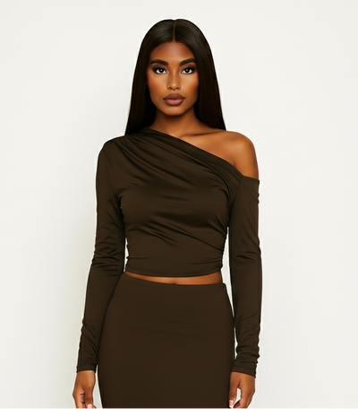 Woman wearing a brown one-shoulder dress 