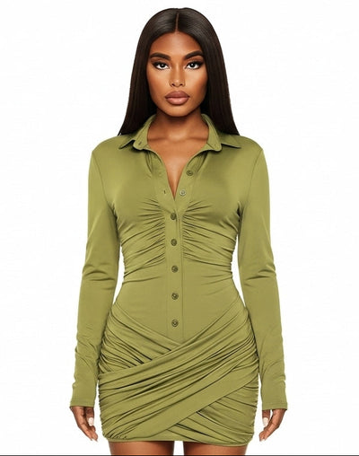 Woman wearing a green ruched dress on a white background