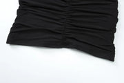 After Dusk Draped Mini Dress with Jeweled Brooch – Black
