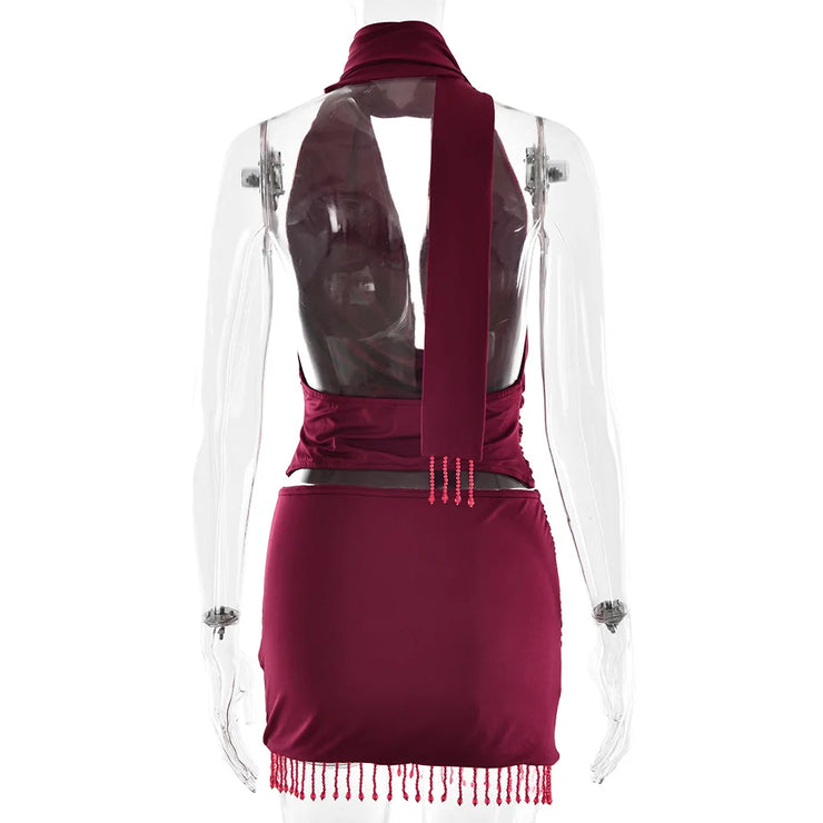 Red dress with a scarf on a transparent mannequin against a white background
