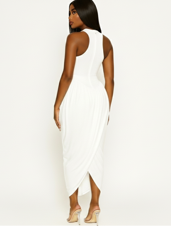 Woman wearing a white sleeveless dress on a plain background