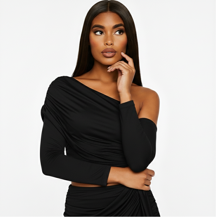 Woman wearing a black one-shoulder dress on a white background
