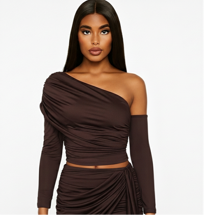 Woman wearing a brown one-shoulder dress on a white background