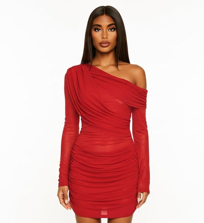 Red one-shoulder dress worn by a model on a white background